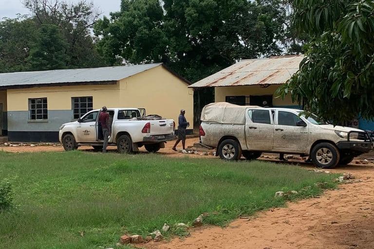 field vehicles with survey team