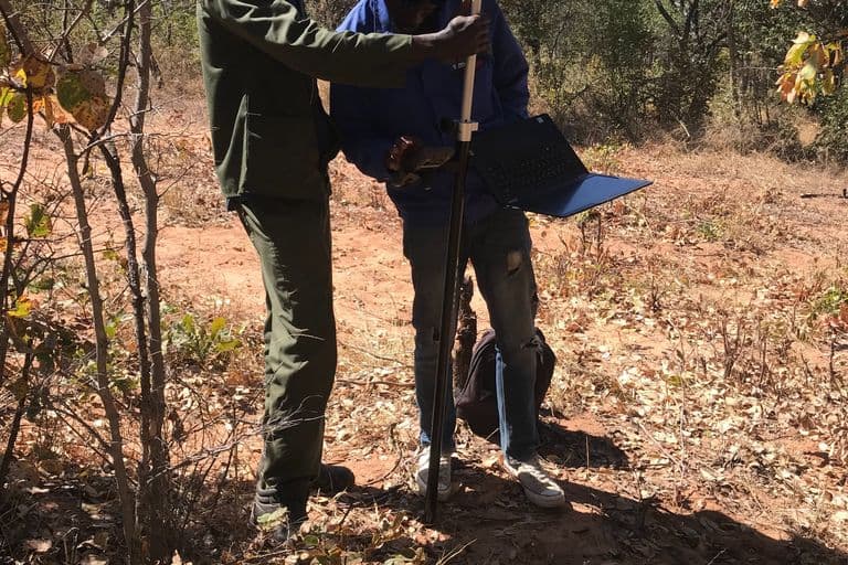 Surveyor with gnss receiver and laptop